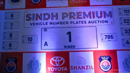 Sindh Premium vehicle number plates auction display with car number plates and sponsor logos